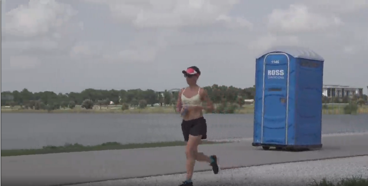 Passing joggers in my motorized port-a-potty