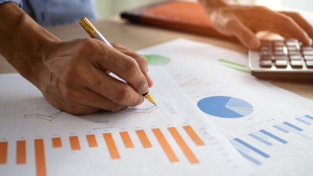 person working on financial documents