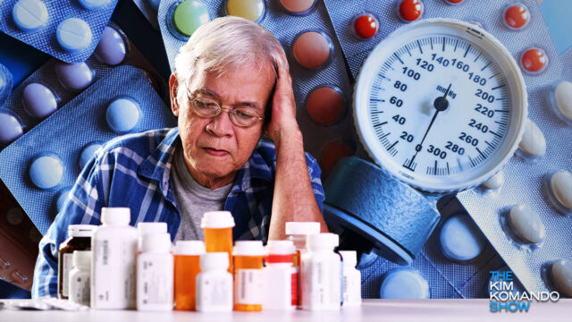 man sitting at a table with medication bottles