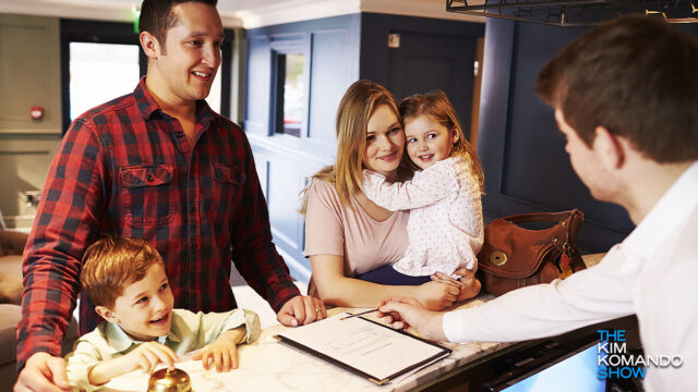 family-checking-into-a-hotel-room