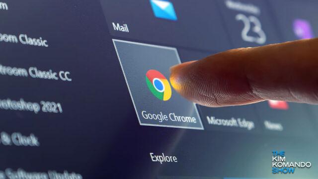 computer showing Google Chrome icon with a finger pressing it