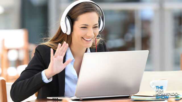 woman calling home from a hotel via her laptop