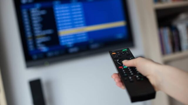 adjusting tv settings with remote control