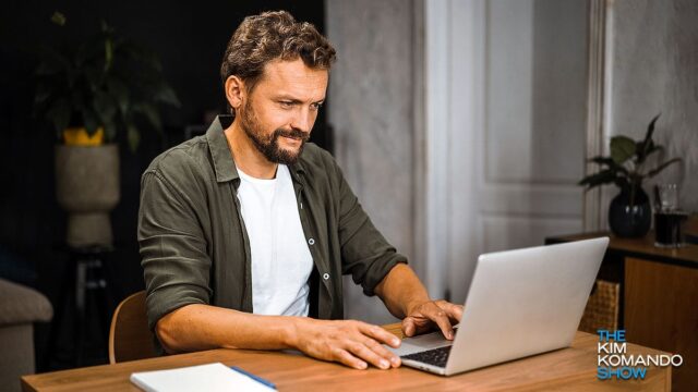 older, intense-looking man working from home